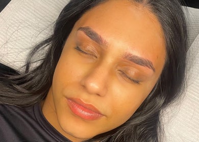 Client with meticulously sculpted eyebrows at SKULPTED, Fairfield, New South Wales, AU.