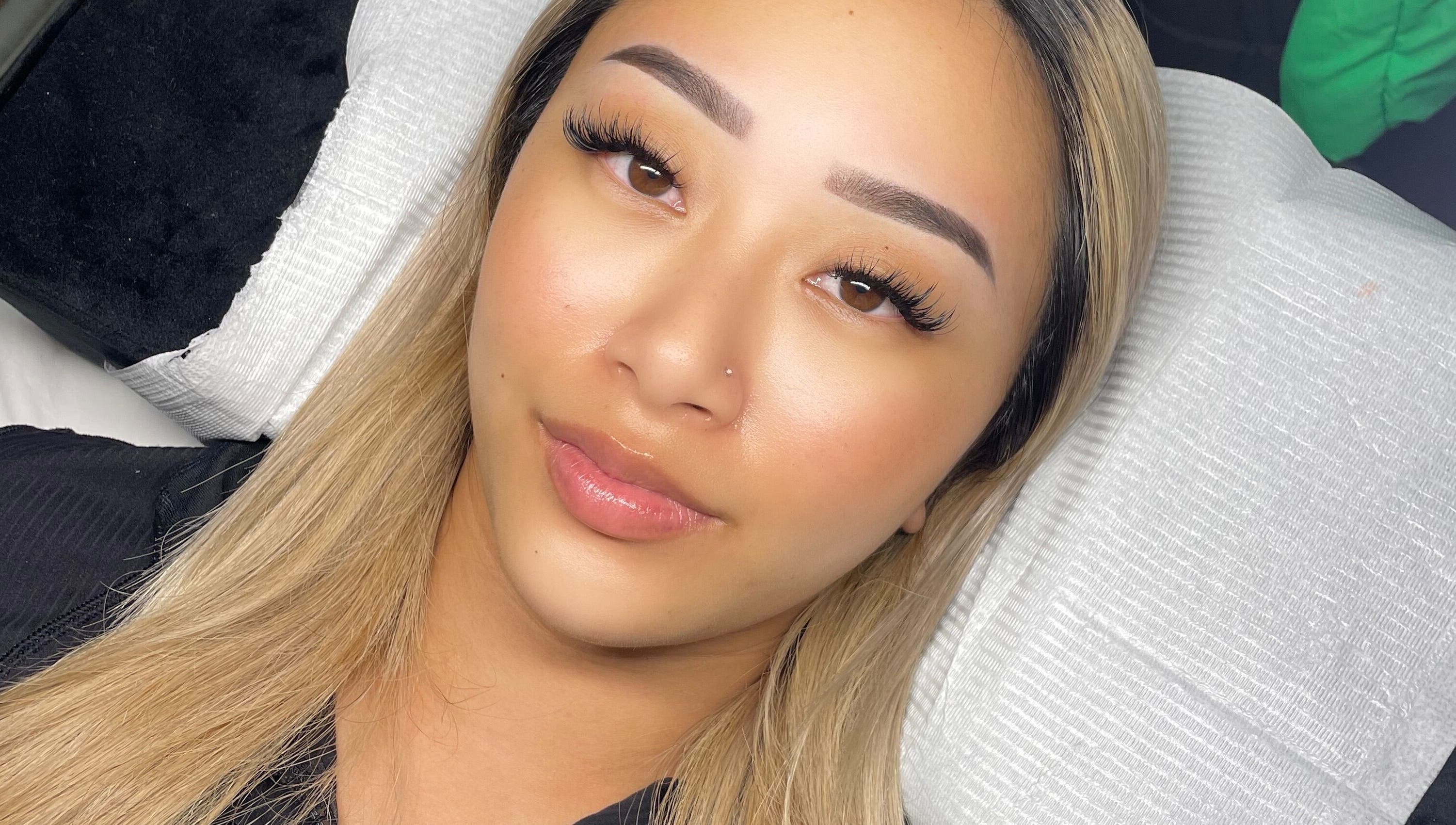 Close-up of woman with enhanced eyelashes at SKULPTED, Fairfield, New South Wales, AU.