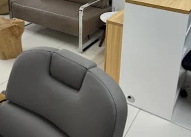 Stylish interior of X Hair and Beauty Salon in Quatre Bornes, Plaines Wilhems District, MU with modern seating.
