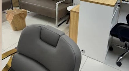 Stylish interior of X Hair and Beauty Salon in Quatre Bornes, Plaines Wilhems District, MU with modern seating.