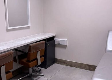 Modern treatment room at Beautyyou Aesthetic & Cosmetology, Waterford, County Waterford, IE. Comfortable chairs and table.