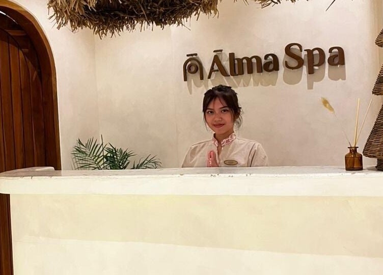 Receptionist at serene entrance of Alma Spa Bali Canggu, located in Bali, Bali, ID.