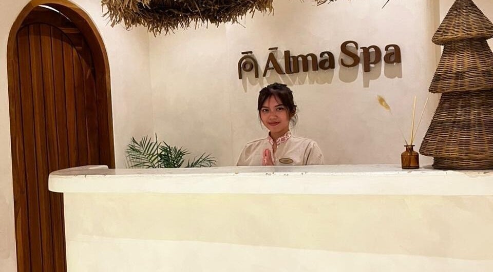 Receptionist at serene entrance of Alma Spa Bali Canggu, located in Bali, Bali, ID.