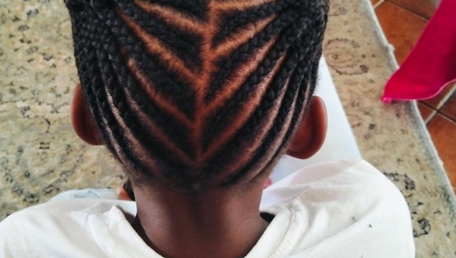 Detailed cornrow hairstyle at 8 dunlin road terenure, Kempton Park, ZA, showcasing expert braiding technique.