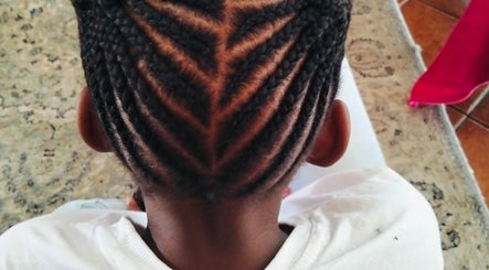 Detailed cornrow hairstyle at 8 dunlin road terenure, Kempton Park, ZA, showcasing expert braiding technique.