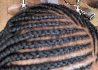 Intricate braid hairstyle at 8 Dunlin Road, Terenure, Kempton Park, ZA salon.