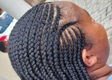 Close-up of braided hairstyle at 8 Dunlin road Terenure, Kempton Park, Gauteng, ZA.