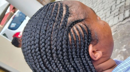 Close-up of braided hairstyle at 8 Dunlin road Terenure, Kempton Park, Gauteng, ZA.