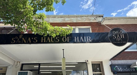 Sana's Haus of Hair entrance in Bexley North, New South Wales, AU with vibrant signage.