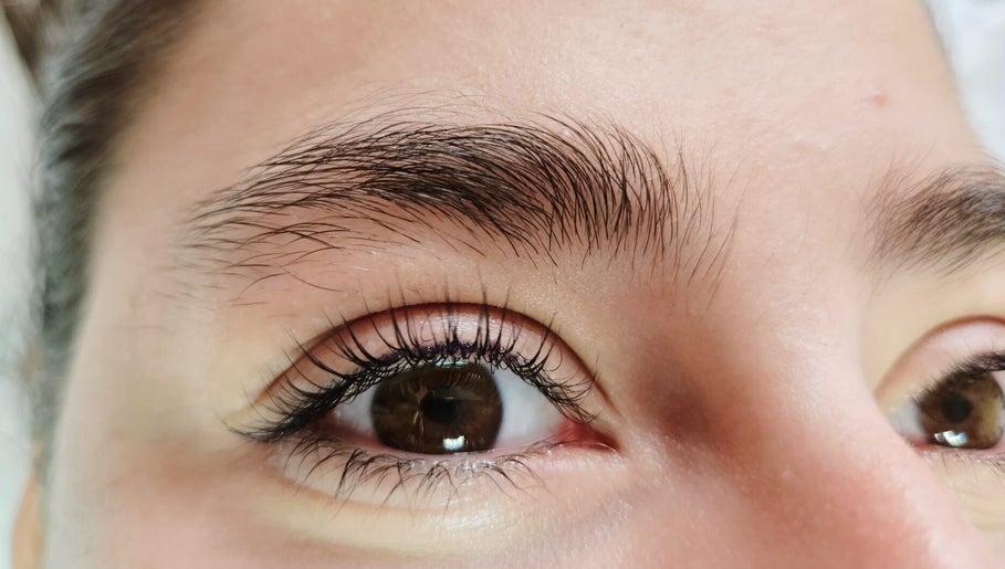 Close-up of elegantly shaped brows and lashes at Beauty Artisan, Norwich, England, GB.