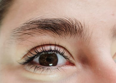 Close-up of elegantly shaped brows and lashes at Beauty Artisan, Norwich, England, GB.