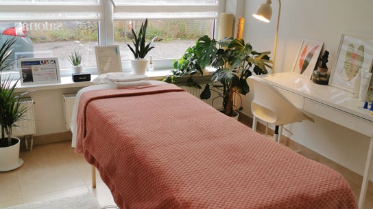 Massage therapist Mikalai