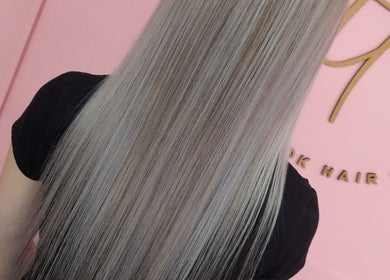 Smooth, straight grey hair showcased at The Look Hair Gallery, Potchefstroom, North West, ZA.