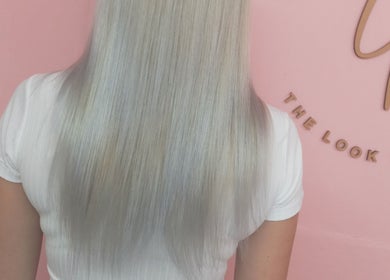 Sleek silver hair styling at The Look Hair Gallery, Potchefstroom, North West, ZA.