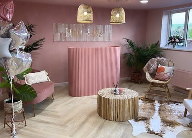 Elegant pink reception area at Nails by Gem, Newtownabbey, Northern Ireland, GB with stylish decor.