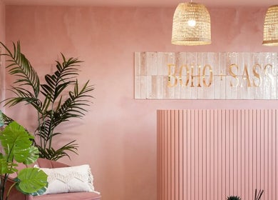 Stylish pink interior at Nails by Gem, Newtownabbey, Northern Ireland, GB with boho decor and plant accents.