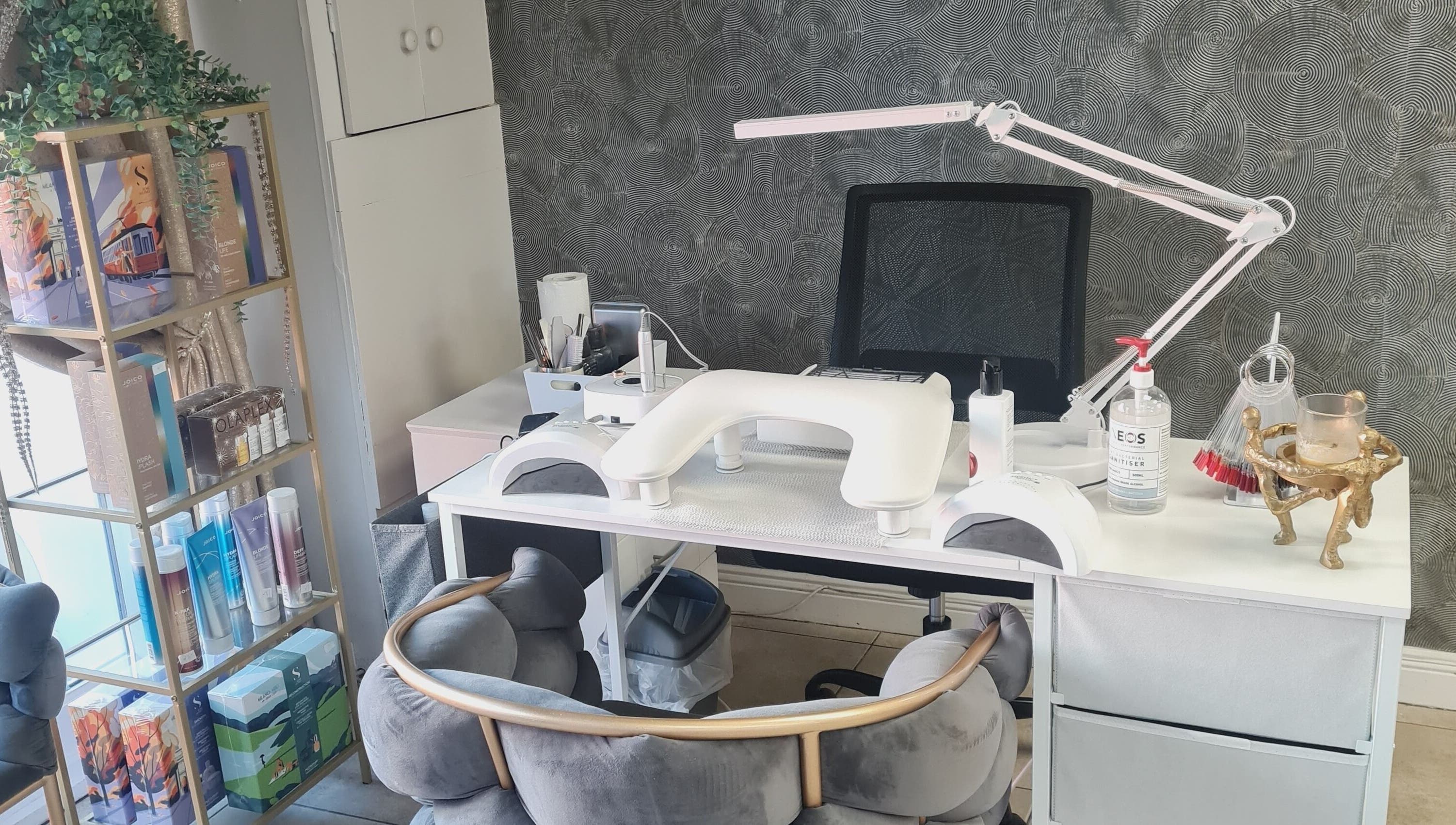 Elegant nail station at Nails by Ina, Mullingar, County Westmeath, IE, featuring manicure tools and seating.