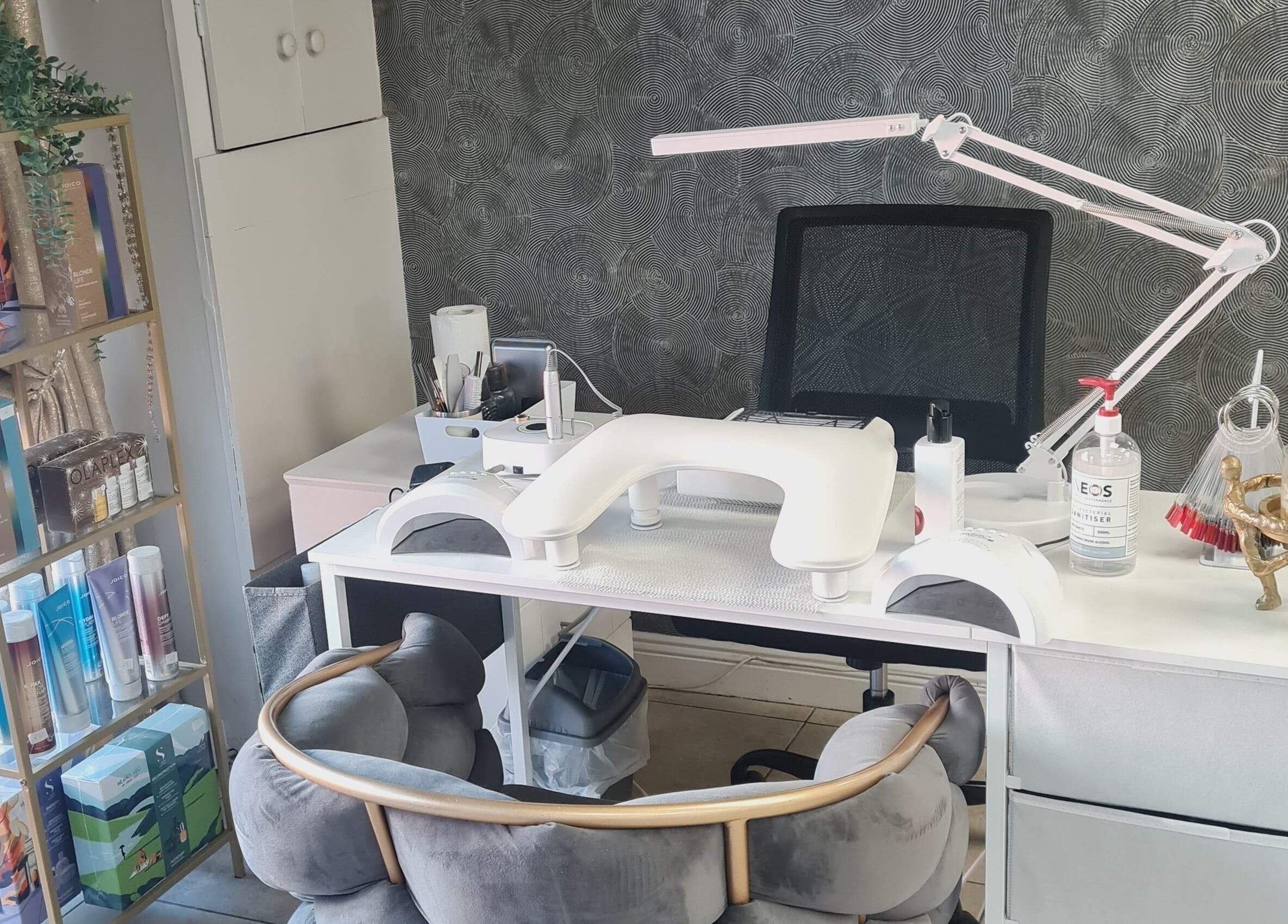 Elegant nail station at Nails by Ina, Mullingar, County Westmeath, IE, featuring manicure tools and seating.