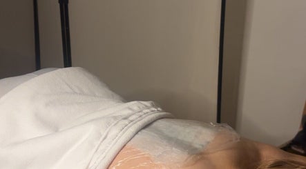 Client receiving treatment at AMS Sports Therapy, Wishaw, Scotland, GB, showcasing expert wellness care.