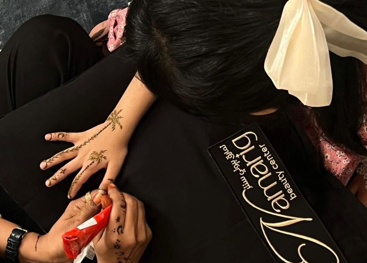 Henna design being applied at Namarig beauty center, Doha, Doha Municipality, QA.