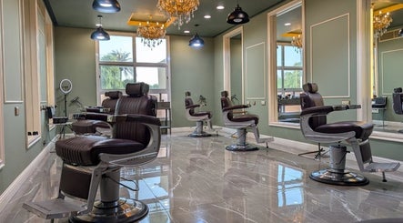 Luxurious salon area at BOUTIQUE SPA, Abu Dhabi, Abu Dhabi, AE with stylish chairs and chandeliers.