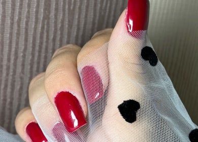 Stunning red manicured nails at She & He Studio, Llanybydder, Wales, GB wrapped in elegant white mesh.