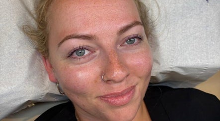 A relaxed client with radiant skin post-treatment at The Glow Room - Calne in Calne, England, GB.