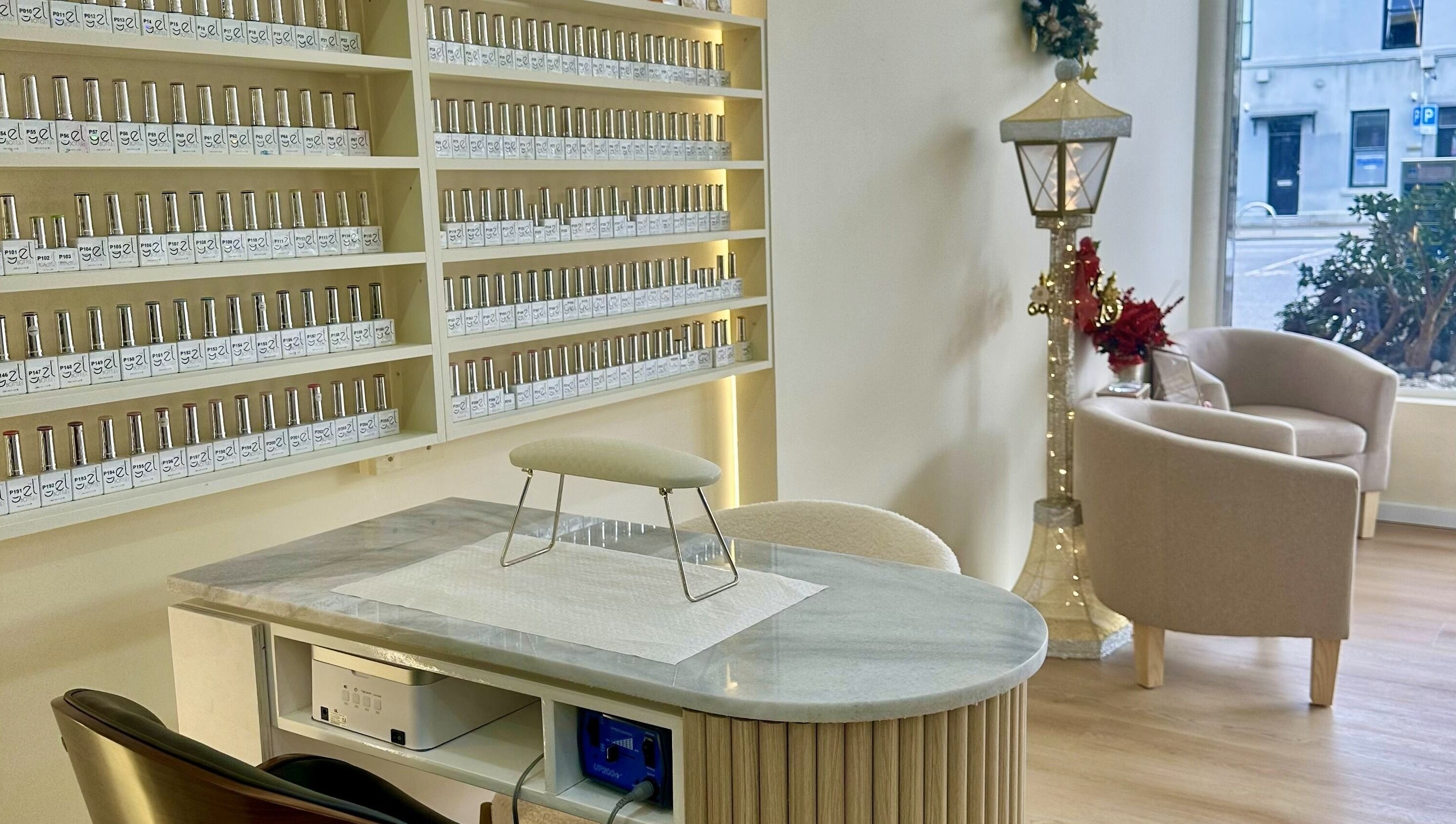Chic interior of Posh Nails Boutique in Melbourne, Victoria, AU, featuring elegant nail polish display.
