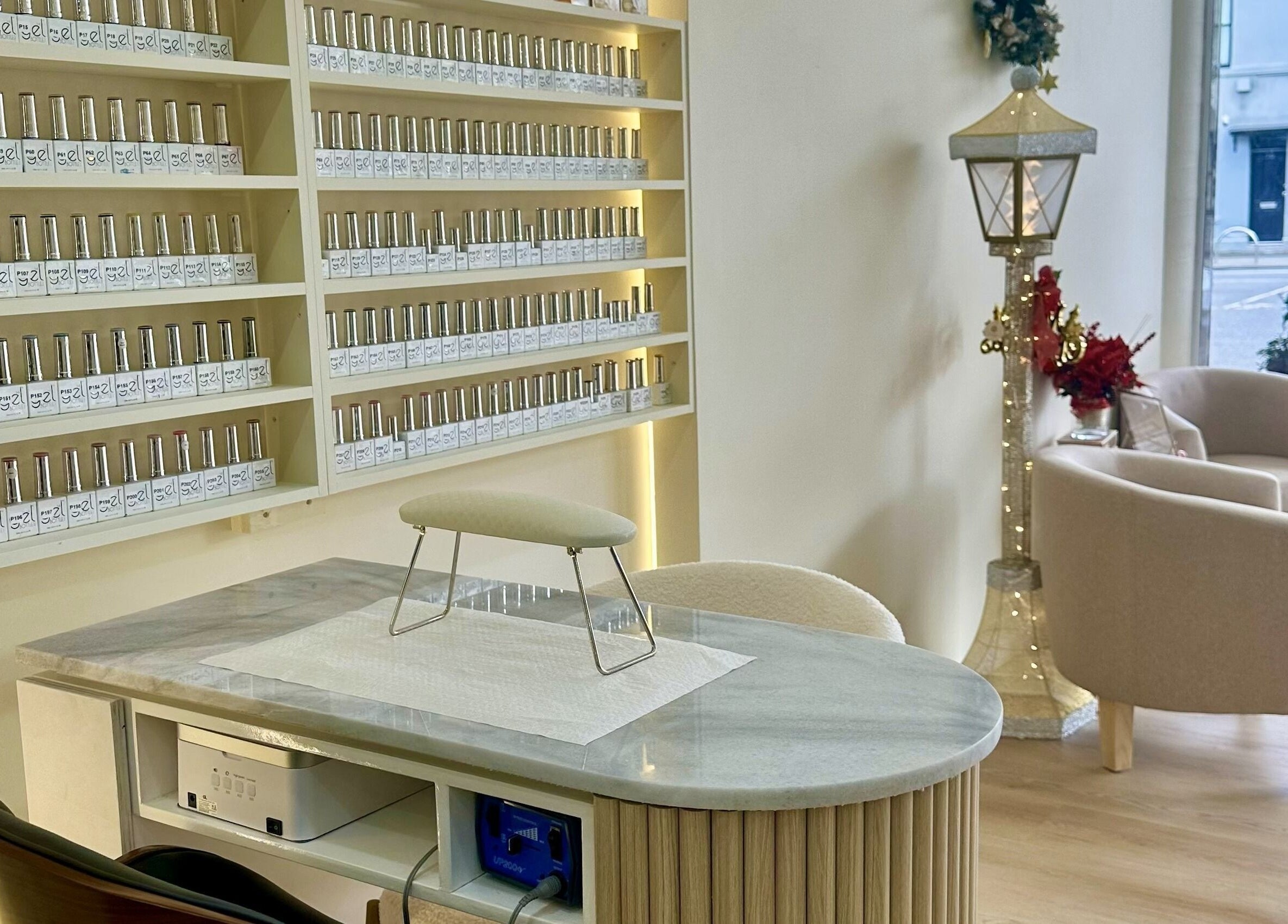 Chic interior of Posh Nails Boutique in Melbourne, Victoria, AU, featuring elegant nail polish display.