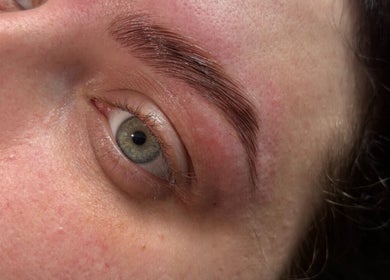 Expert eyebrow shaping at sslashnbrow in Port Talbot, Wales, GB showcases perfect arch and definition.