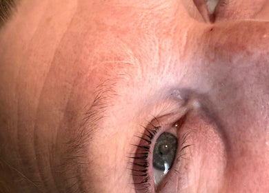 Close-up of a client’s eye showcasing lash enhancement at sslashnbrow, Port Talbot, Wales, GB.