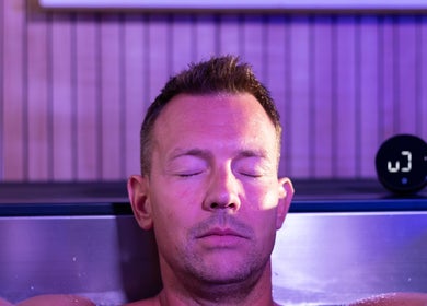 Man relaxing in ice bath at DARR Ice Bath Curacao, Willemstad, CW.