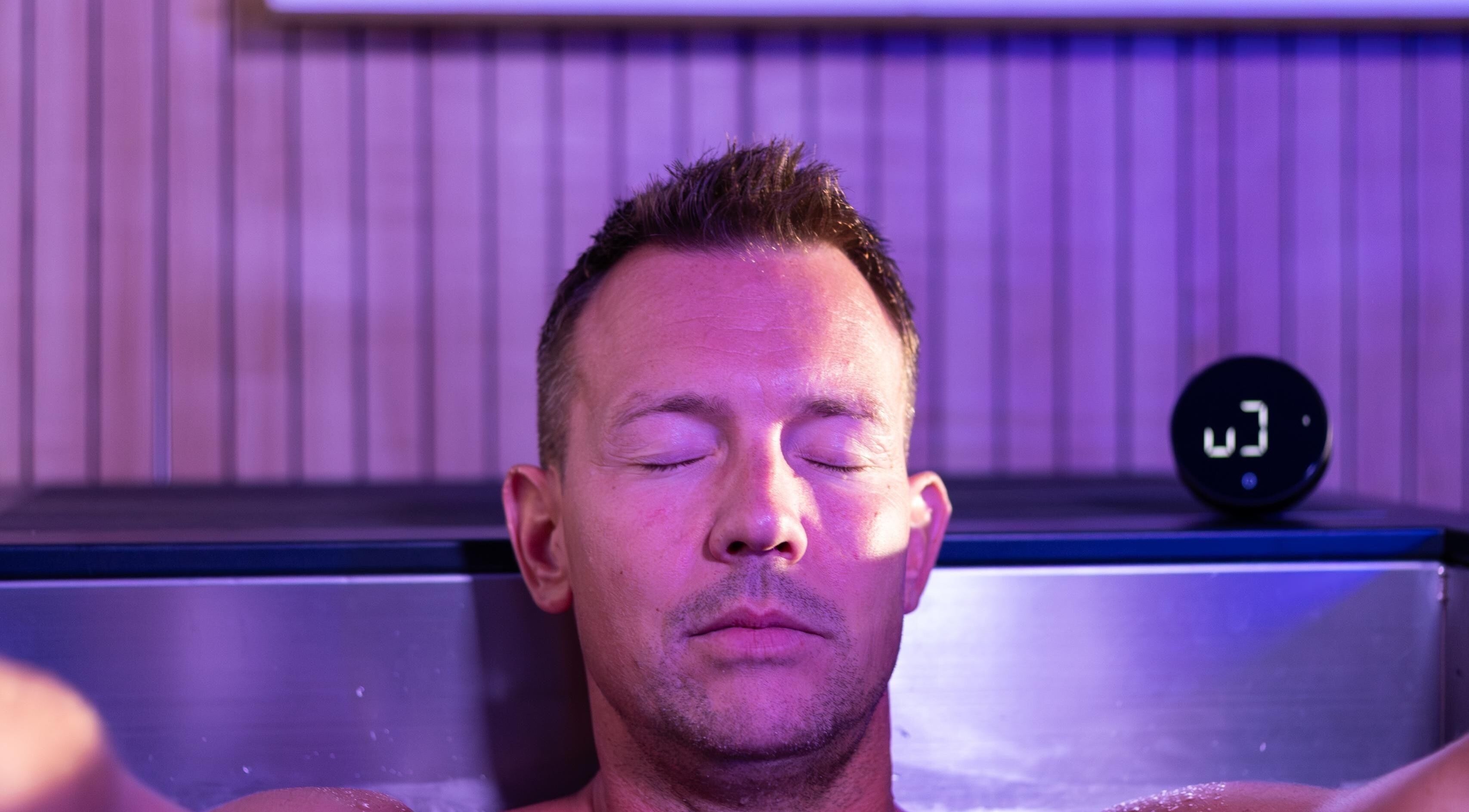 Man relaxing in ice bath at DARR Ice Bath Curacao, Willemstad, CW.