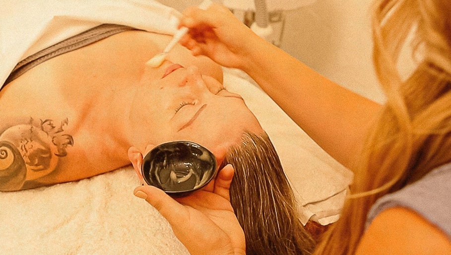 Person receiving facial treatment at Balanced Beauty by Leandra in Fort Pierce, Florida, US.