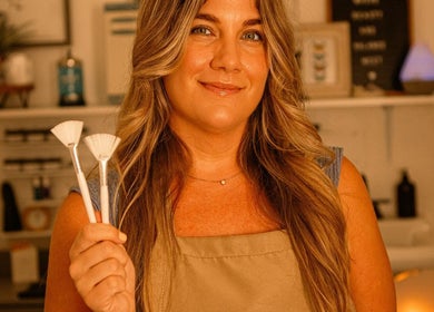 Aesthetician with brushes at Balanced Beauty by Leandra in Fort Pierce, Florida, US.