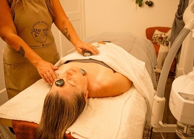Hot stone therapy at Balanced Beauty by Leandra in Fort Pierce, Florida, US promoting relaxation and wellness.