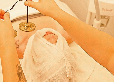 Relaxing spa treatment at Balanced Beauty by Leandra in Fort Pierce, Florida, US using soothing tools.