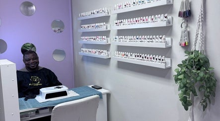 Nail Emperor manicure station with vibrant polish display in Sandton, Gauteng, ZA.