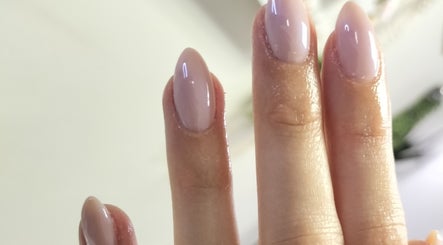 Elegant nail design at Nail Emperor, Sandton, Gauteng, ZA. Glossy, manicured nails showcased in stylish detail.