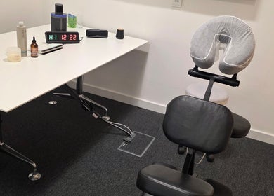 Massage chair and table setup at The Thera Pt, Blackburn, Scotland, GB for a relaxing wellness experience.
