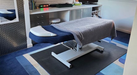 Therapy bed in a serene room at The Thera Pt, Blackburn, Scotland, GB for ultimate relaxation.