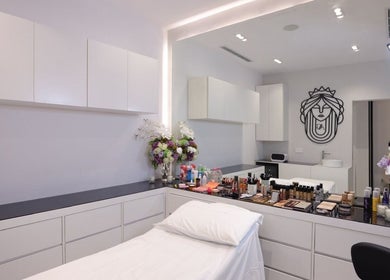 Art Glam beauty room with makeup essentials and flowers in Riyadh, Riyadh Province, SA.
