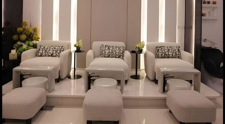 Luxurious seating area in Art Glam, Riyadh, Riyadh Province, SA with plush chairs and subtle lighting.