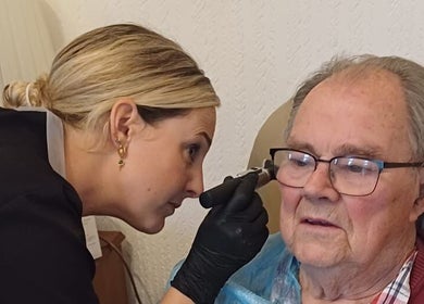 Professional wellness service at Echo & Eppie, Bridgend, Wales, GB, showcasing meticulous ear care.
