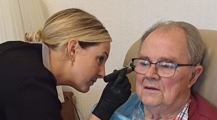 Professional wellness service at Echo & Eppie, Bridgend, Wales, GB, showcasing meticulous ear care.