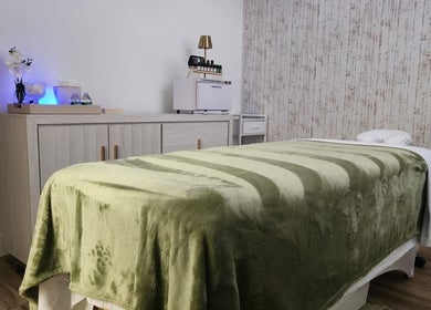 Relaxing massage room at Marinez Maia Aesthetic & Massage, Orlando, Florida, US with a calming ambiance.
