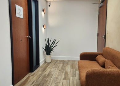 Warm, inviting hallway at Marinez Maia Aesthetic & Massage, Orlando, Florida, US.
