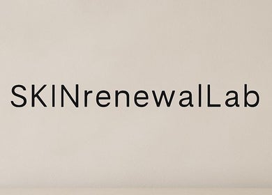 Clean SKINrenewalLab logo on textured wall in Bury, England, GB, showcasing minimalist design.