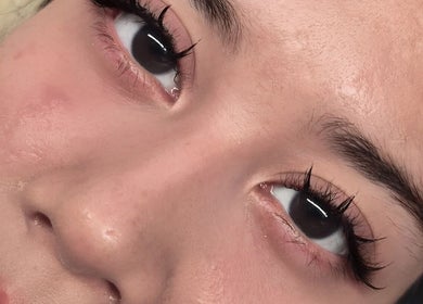 Close-up of a client's elegant eyelash extensions at Rose Merah Lash Brow Studio, Nilai, Negeri Sembilan, MY.