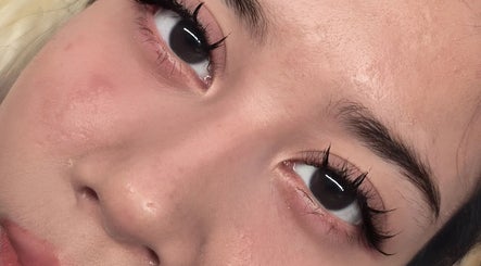 Close-up of a client's elegant eyelash extensions at Rose Merah Lash Brow Studio, Nilai, Negeri Sembilan, MY.